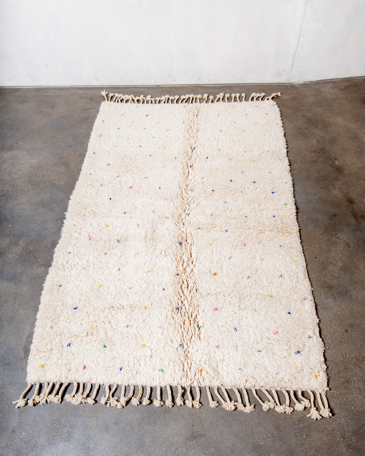Modern, designer, handcrafted Berber rug from Morocco. Beniourain carpet with beautiful colours and patterns and fluffy wool texture.